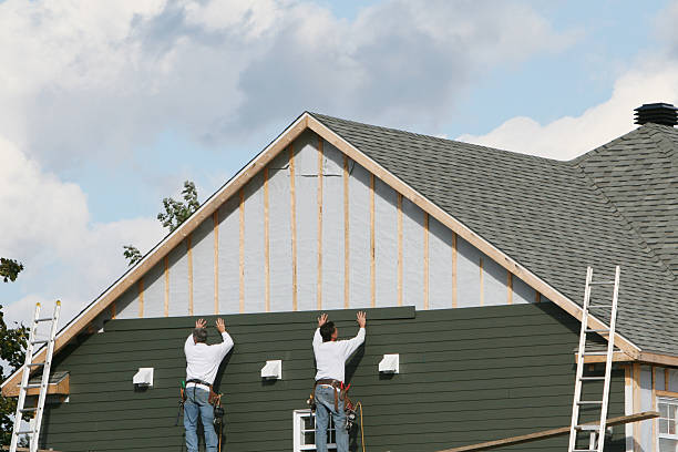 Professional Siding Installation technician working in Brooksville, KY